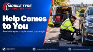 Mobile tyre fitter repairing a flat tyre at the roadside in Oxford